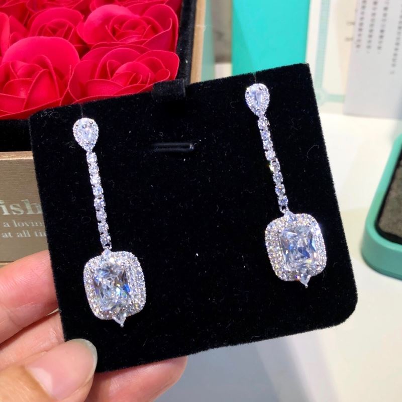 T*f*ny earrings